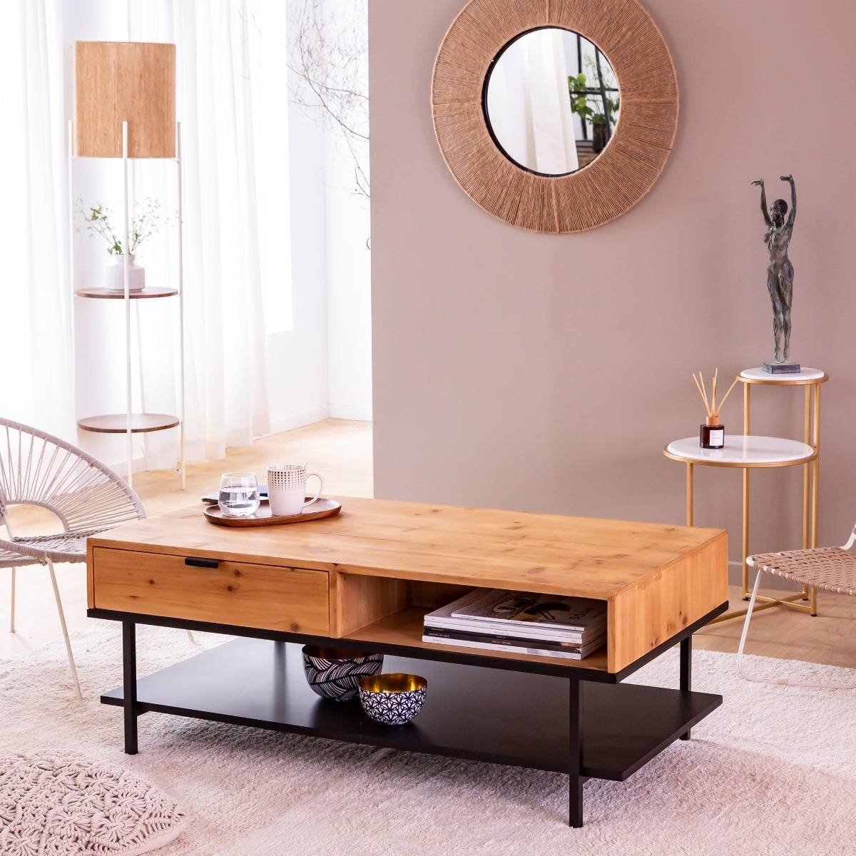 Vandana Elara Zenova – Enola Coffee Table in Solid Fir Wood & Black Metal | Industrial Contemporary Furniture The Vandana Elara Zenova – Enola Coffee Table is a perfect blend of industrial aesthetics, practical functionality, and long-lasting craftsmanship. Designed for modern homes, loft-style interiors, cafés, offices, and hospitality spaces, this coffee table brings together the natural warmth of solid fir wood with the strength and character of a black metal frame, creating a bold yet balanced centerpiece. Measuring 120 cm in length, 60 cm in width, and 48 cm in height, the Enola coffee table offers a generously proportioned surface ideal for everyday living and social gatherings. Whether you are serving drinks, displaying books, décor accents, or creating a welcoming lounge atmosphere, its rectangular shape and clean lines make it both versatile and visually appealing. The solid fir wood tabletop showcases natural grain patterns and a warm, organic texture that softens the industrial edge of the metal base. Fir wood is known for its lightweight strength and durability, making it a practical choice for long-term daily use while maintaining a refined, natural appearance. Each table carries subtle variations in wood grain, ensuring that every piece feels authentic and unique. Supporting the wooden top is a robust black metal structure, engineered for stability and durability. The contrast between raw wood and metal creates a timeless industrial look that fits seamlessly into modern, minimalist, Scandinavian-industrial, and urban interiors. This versatile design allows the Enola coffee table to adapt effortlessly to both residential and commercial environments. A functional highlight of this table is its integrated usable drawer area (54 × 26 × 13 cm), offering discreet storage for remote controls, magazines, or everyday essentials, helping keep your living space organized and clutter-free. Part of the Enola Collection, the Vandana Elara Zenova coffee table reflects thoughtful design and export-quality craftsmanship. Delivered as a kit with precise components, it ensures secure packaging and efficient transport while maintaining strength and stability once assembled. Stylish, durable, and practical, the Vandana Elara Zenova – Enola Fir Wood Coffee Table is an ideal choice for buyers seeking industrial coffee tables, solid wood and metal furniture, and premium export-quality home décor.Vandana Elara Zenova – Enola Coffee Table in Solid Fir Wood & Black Metal | Industrial Contemporary Furniture The Vandana Elara Zenova – Enola Coffee Table is a perfect blend of industrial aesthetics, practical functionality, and long-lasting craftsmanship. Designed for modern homes, loft-style interiors, cafés, offices, and hospitality spaces, this coffee table brings together the natural warmth of solid fir wood with the strength and character of a black metal frame, creating a bold yet balanced centerpiece. Measuring 120 cm in length, 60 cm in width, and 48 cm in height, the Enola coffee table offers a generously proportioned surface ideal for everyday living and social gatherings. Whether you are serving drinks, displaying books, décor accents, or creating a welcoming lounge atmosphere, its rectangular shape and clean lines make it both versatile and visually appealing. The solid fir wood tabletop showcases natural grain patterns and a warm, organic texture that softens the industrial edge of the metal base. Fir wood is known for its lightweight strength and durability, making it a practical choice for long-term daily use while maintaining a refined, natural appearance. Each table carries subtle variations in wood grain, ensuring that every piece feels authentic and unique. Supporting the wooden top is a robust black metal structure, engineered for stability and durability. The contrast between raw wood and metal creates a timeless industrial look that fits seamlessly into modern, minimalist, Scandinavian-industrial, and urban interiors. This versatile design allows the Enola coffee table to adapt effortlessly to both residential and commercial environments. A functional highlight of this table is its integrated usable drawer area (54 × 26 × 13 cm), offering discreet storage for remote controls, magazines, or everyday essentials, helping keep your living space organized and clutter-free. Part of the Enola Collection, the Vandana Elara Zenova coffee table reflects thoughtful design and export-quality craftsmanship. Delivered as a kit with precise components, it ensures secure packaging and efficient transport while maintaining strength and stability once assembled. Stylish, durable, and practical, the Vandana Elara Zenova – Enola Fir Wood Coffee Table is an ideal choice for buyers seeking industrial coffee tables, solid wood and metal furniture, and premium export-quality home décor. Vandana Elara Zenova – Enola Coffee Table in Solid Fir Wood & Black Metal | Industrial Contemporary Furniture The Vandana Elara Zenova – Enola Coffee Table is a perfect blend of industrial aesthetics, practical functionality, and long-lasting craftsmanship. Designed for modern homes, loft-style interiors, cafés, offices, and hospitality spaces, this coffee table brings together the natural warmth of solid fir wood with the strength and character of a black metal frame, creating a bold yet balanced centerpiece. Measuring 120 cm in length, 60 cm in width, and 48 cm in height, the Enola coffee table offers a generously proportioned surface ideal for everyday living and social gatherings. Whether you are serving drinks, displaying books, décor accents, or creating a welcoming lounge atmosphere, its rectangular shape and clean lines make it both versatile and visually appealing. The solid fir wood tabletop showcases natural grain patterns and a warm, organic texture that softens the industrial edge of the metal base. Fir wood is known for its lightweight strength and durability, making it a practical choice for long-term daily use while maintaining a refined, natural appearance. Each table carries subtle variations in wood grain, ensuring that every piece feels authentic and unique. Supporting the wooden top is a robust black metal structure, engineered for stability and durability. The contrast between raw wood and metal creates a timeless industrial look that fits seamlessly into modern, minimalist, Scandinavian-industrial, and urban interiors. This versatile design allows the Enola coffee table to adapt effortlessly to both residential and commercial environments. A functional highlight of this table is its integrated usable drawer area (54 × 26 × 13 cm), offering discreet storage for remote controls, magazines, or everyday essentials, helping keep your living space organized and clutter-free. Part of the Enola Collection, the Vandana Elara Zenova coffee table reflects thoughtful design and export-quality craftsmanship. Delivered as a kit with precise components, it ensures secure packaging and efficient transport while maintaining strength and stability once assembled. Stylish, durable, and practical, the Vandana Elara Zenova – Enola Fir Wood Coffee Table is an ideal choice for buyers seeking industrial coffee tables, solid wood and metal furniture, and premium export-quality home décor.