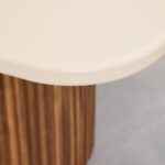 Vandana Grand Flux Rectangular Dining Table in Cement and Acacia Wood – Sirvon Collection is a bold contemporary centerpiece designed for interiors that demand both visual impact and long-term performance. With its refined geometry, contrasting materials, and contract-grade construction, this dining table elevates modern dining rooms, open-plan living spaces, and professional hospitality environments. The tabletop is crafted from high-quality cement with an elegant matte finish, delivering a smooth, durable, and visually striking surface. Cement is valued for its strength, stability, and architectural appeal, making it an excellent choice for large-format dining tables. Its minimalist aesthetic provides a neutral yet powerful foundation, allowing the table to integrate seamlessly into modern, industrial, and contemporary interiors. Supporting the cement top are robust cylindrical legs made from solid acacia wood, finished with a matte brushed effect. Acacia wood is a dense hardwood known for its durability and resistance, offering excellent load-bearing capacity while introducing natural warmth to balance the cool cement surface. This fusion of cement and wood creates a refined contrast that enhances both the tactile and visual character of the table. With generous dimensions of 230 cm in width and 110 cm in depth, the Grand Flux dining table comfortably accommodates up to eight diners. Its rectangular format provides ample surface area for table settings, shared meals, and decorative elements, making it ideal for family gatherings, formal dining, or professional use. A tabletop thickness of 4 cm reinforces the table’s solid and premium presence, while the overall height of 75 cm ensures ergonomic comfort. Designed with practicality in mind, the legs are equipped with adjustable polyethylene floor-protecting plugs. These ensure stability on uneven surfaces while safeguarding floors from scratches or damage. Suitable for indoor use and certified for contract environments, this table meets the demands of hospitality, commercial dining areas, and high-traffic residential settings. Assembly is required to ensure optimal stability and structural integrity. For maintenance, cleaning with a damp cloth is recommended, avoiding chemical products to preserve the cement surface and wood finish. As cement and acacia wood are natural materials, subtle variations in texture, tone, and appearance are inherent and enhance the individuality of each piece. Minor differences in appearance or measurements may occur due to lighting conditions or screen calibration. Customers seeking precise technical clarification are advised to consult technical support prior to purchase, as returns for technical reasons may not be accepted.