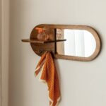 Vandana Optima Arion oval mirror in dark mango wood