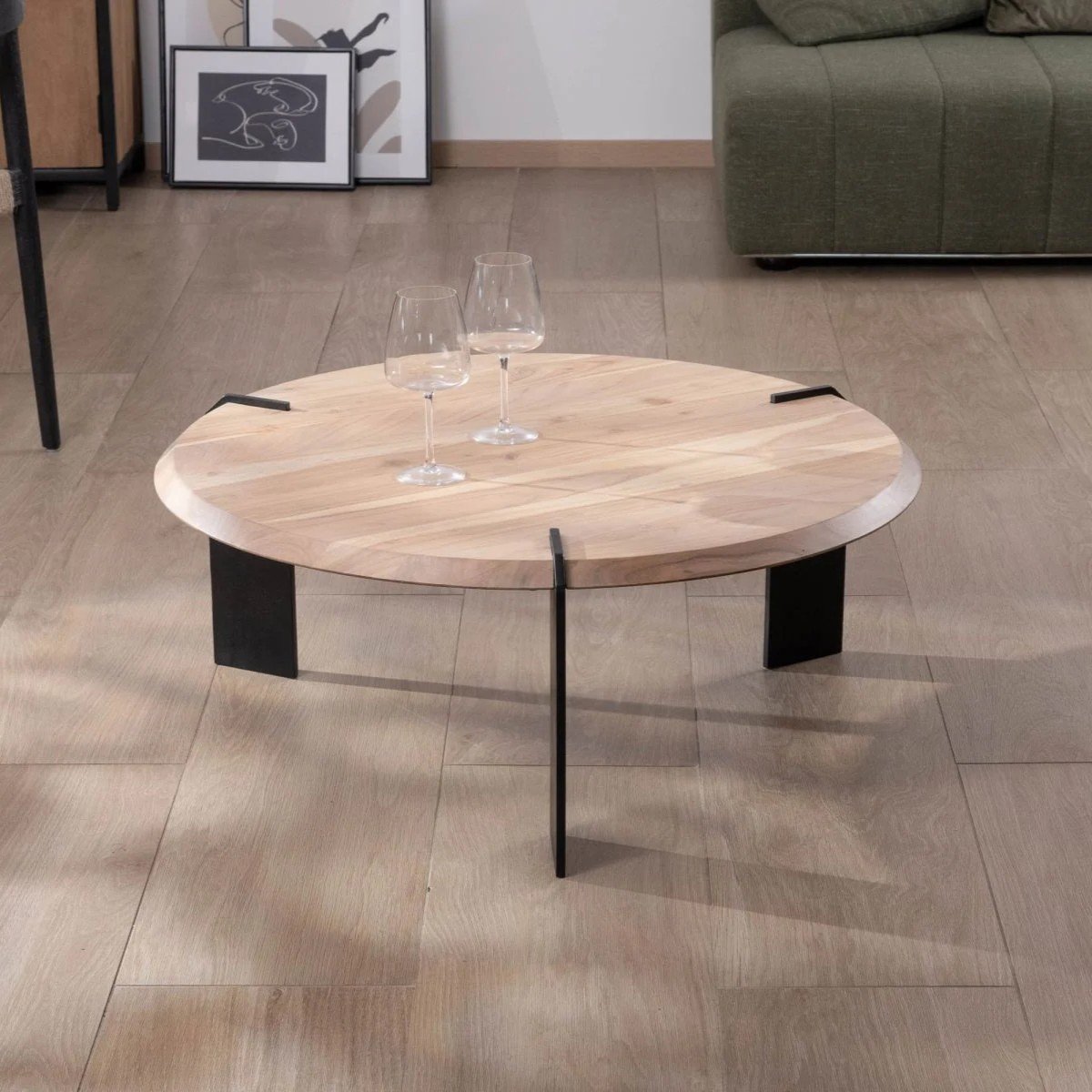 Vandana Golden Living round designer coffee table in acacia wood with 3 black metal legs Vandana Golden Living round designer coffee table in acacia wood with 3 black metal legs